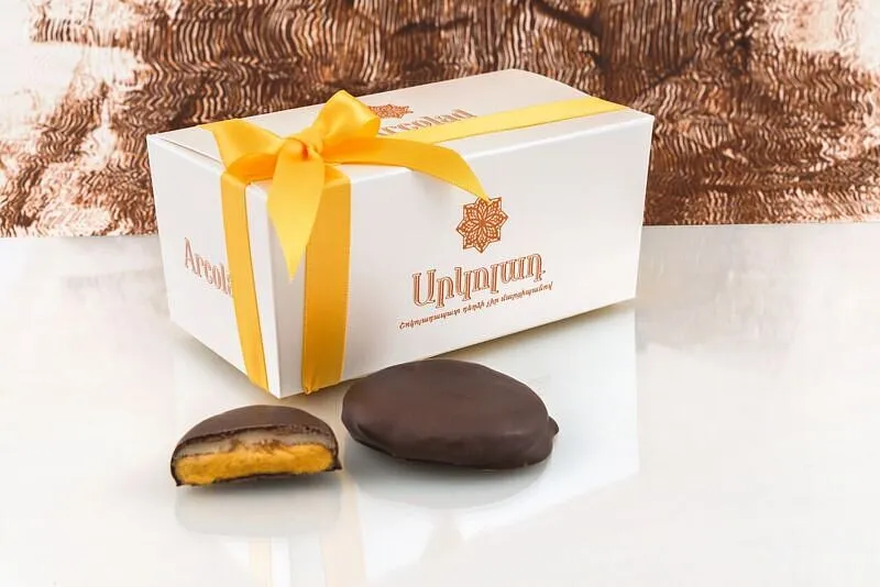 Dried peaches with marzipan in chocolate "Arcolad" 250g