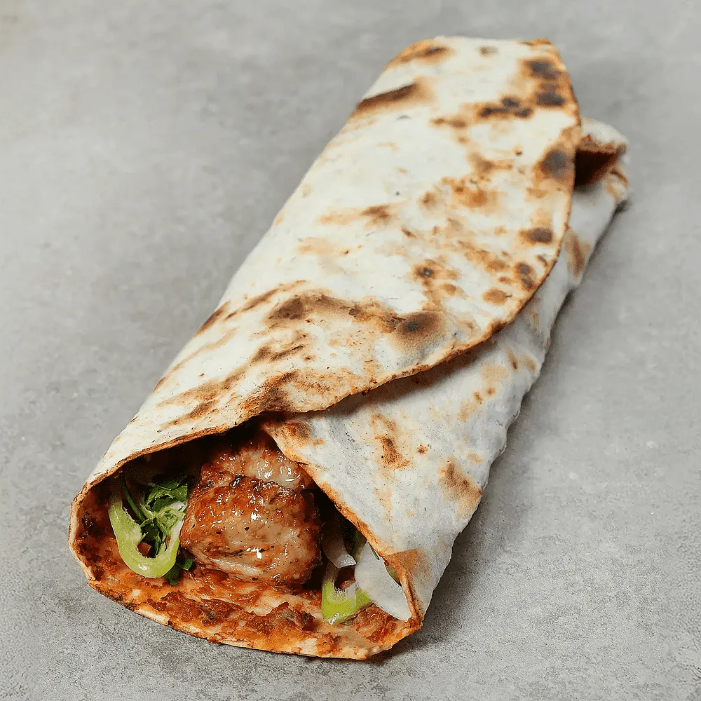 Lahmacun with chicken kebab