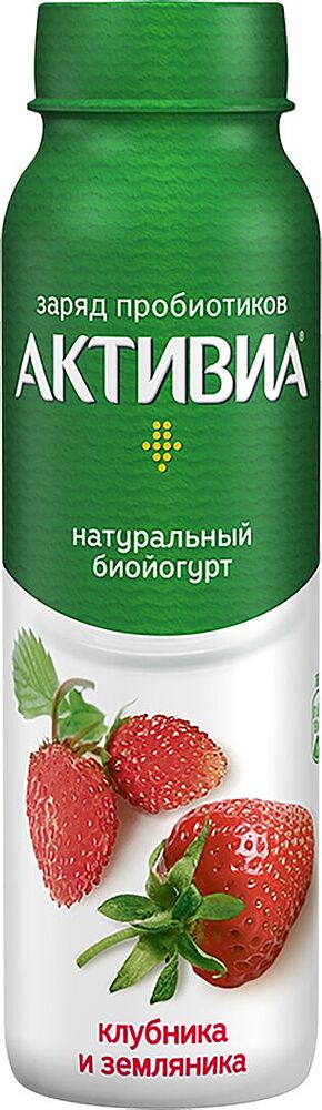 Drinking bioyoghurt with strawberry and wild strawberry 
