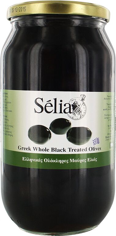 Оливки черные с косточкой "Selia" 990г