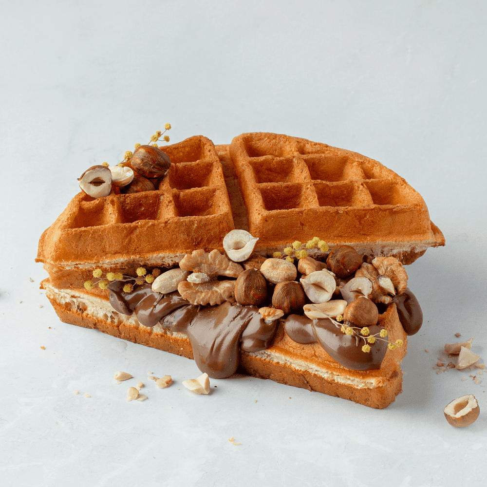 Belgian waffle with nutella and nuts